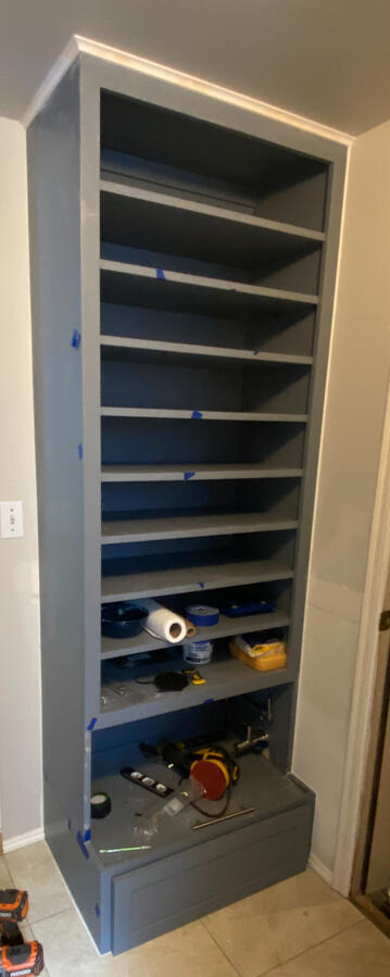 Building a Shoe Storage Closet with Tiled Pet Faucet Area and Food Storage Building a Shoe Storage Closet with Tiled Pet Faucet Area and Food Storage