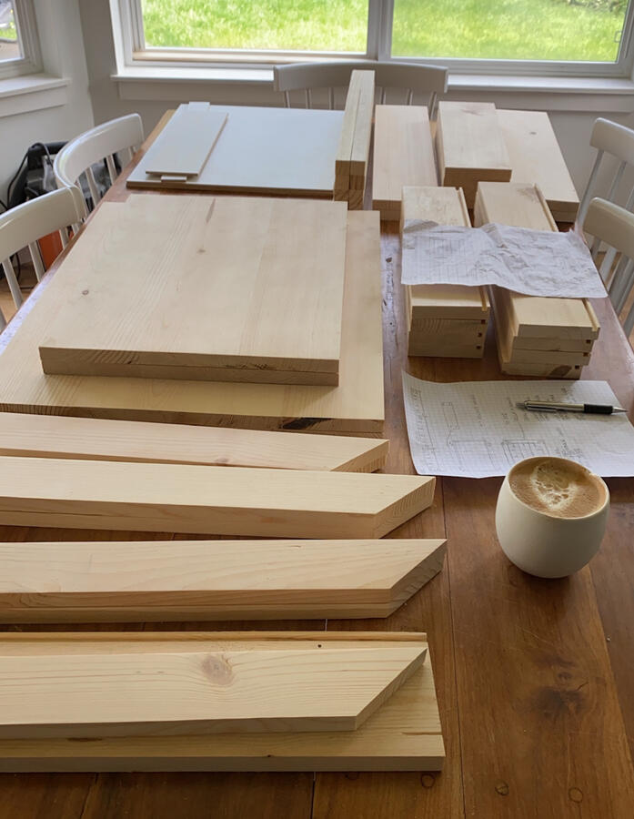 Small Wood Nightstand Parts Before Assembly.